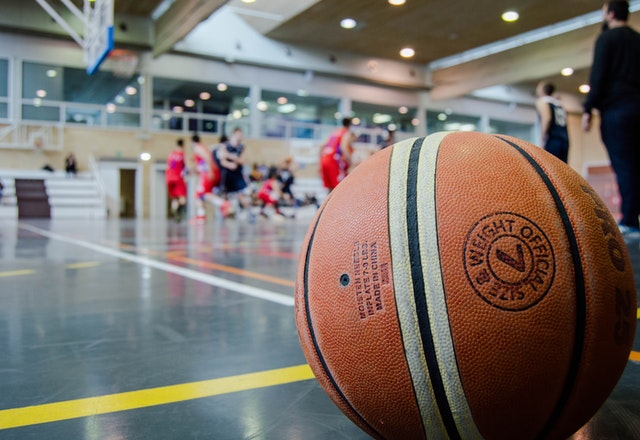 brown basketball on grey floor 945471 1